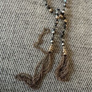 Long multi-toned beaded necklace